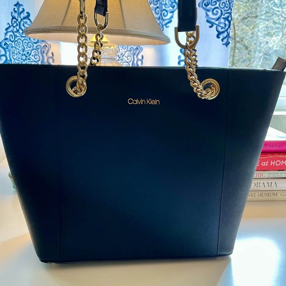 Calvin Klein leather Hayden. Worn once. In pristine condition.
